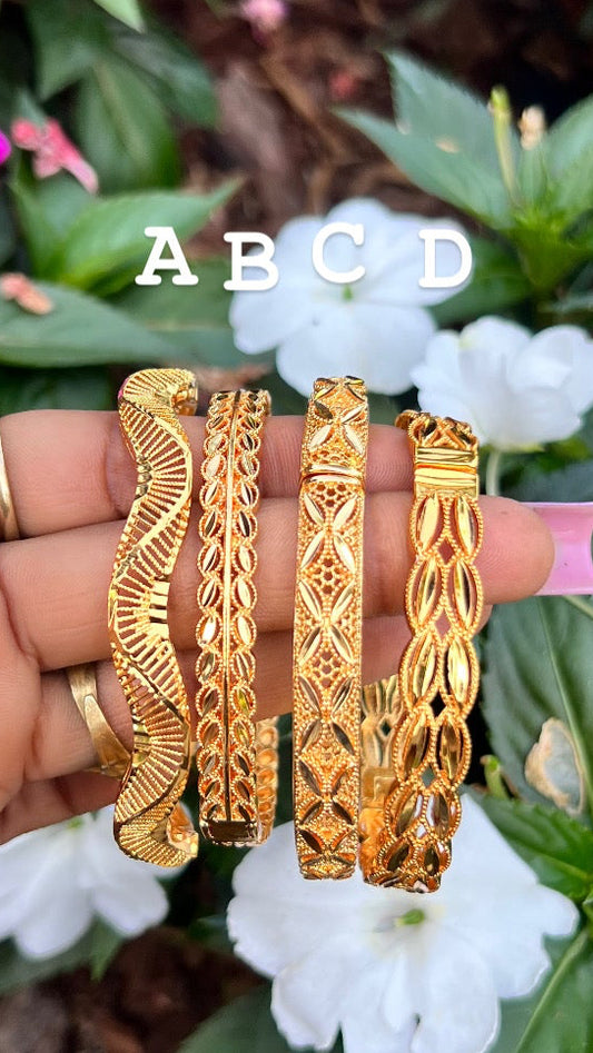 Charm gold bangles